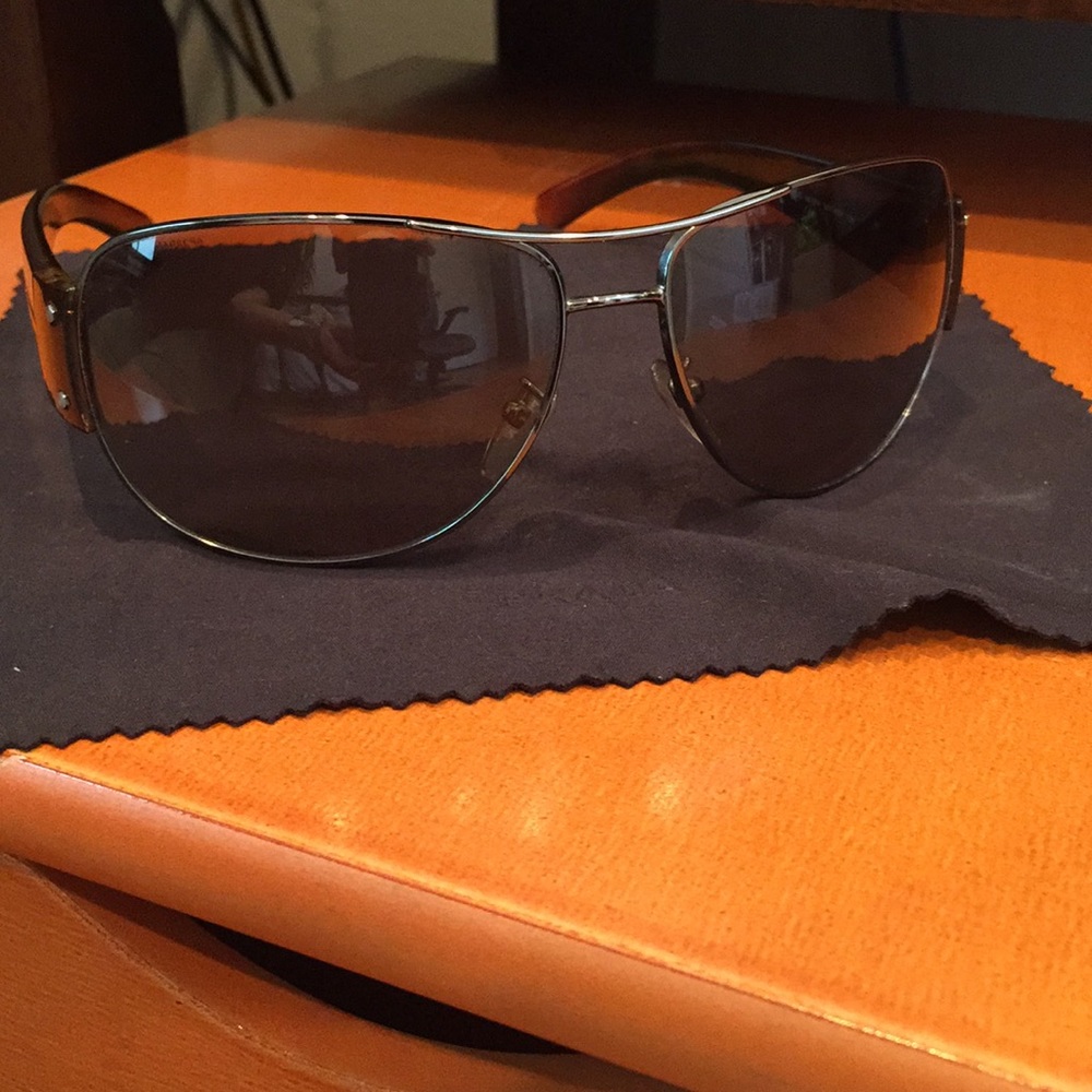 Prada tortoiseshell aviator sunglasses.